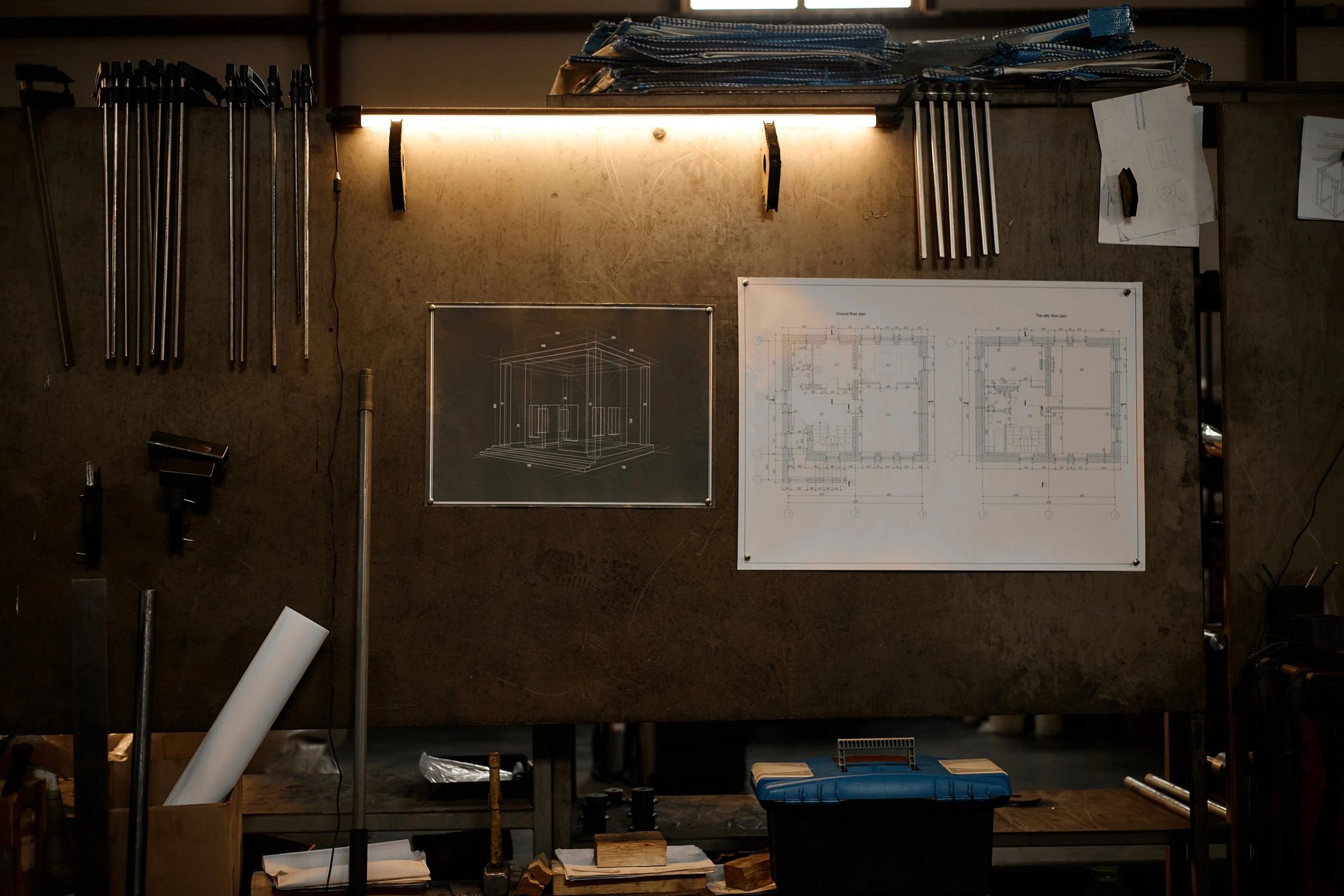 Yacht design planning blueprints in a workshop